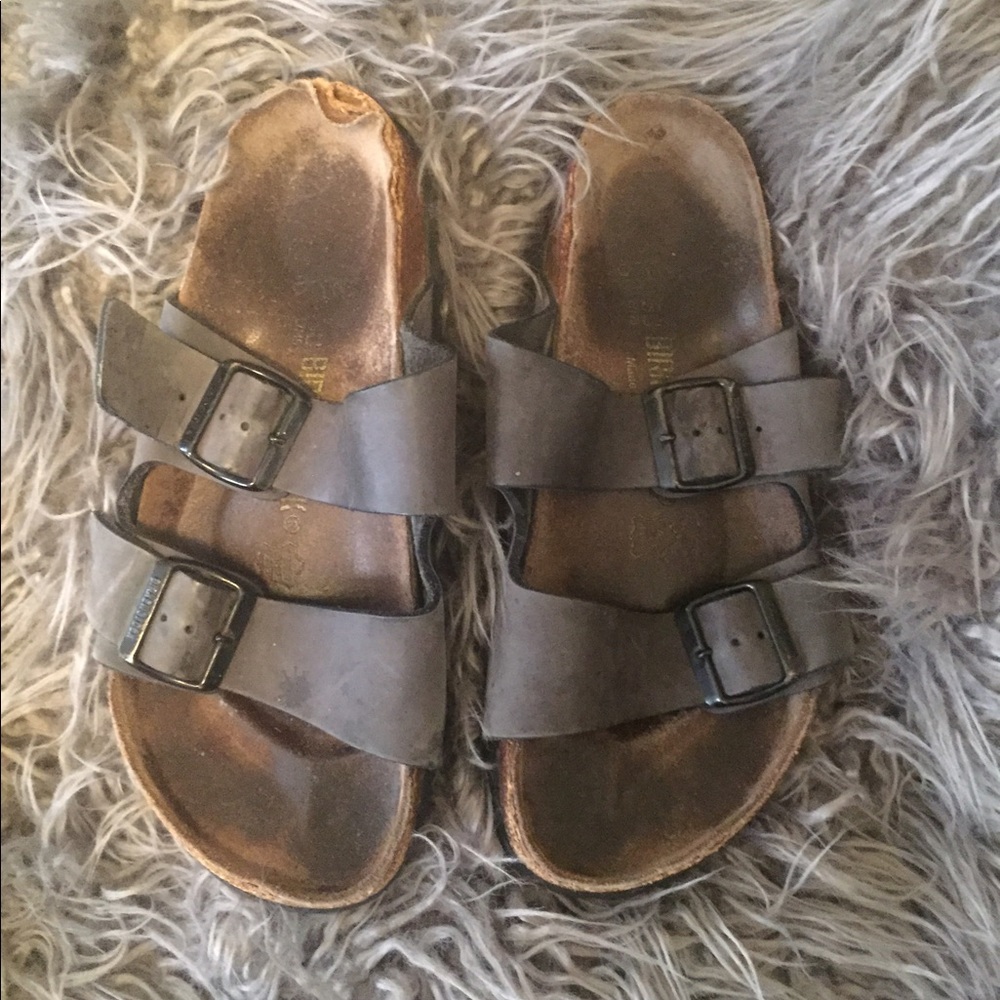 Worn gray Birkenstocks